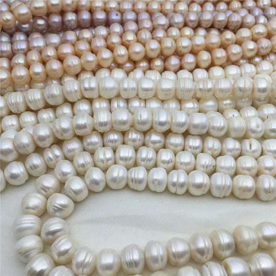 White Button Freshwater Pearl Strands
