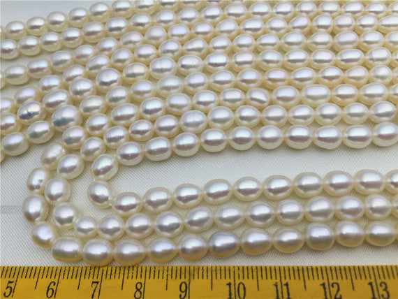 MoniPearl Rice Pearl 6-7mmx7-8mm,3A,very high quality, white rice pearls-16 inch strand, around 55pcs,rice pearl,Full Strand,Freshwater Pearl Rice Beads,LR6-3A-2